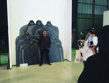A Lyle held up in front of Saatchi Art