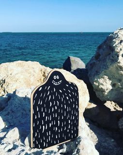 A Lyle held up in front of Key West