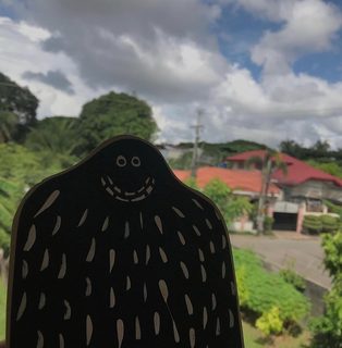 A Lyle held up in front of Philippines