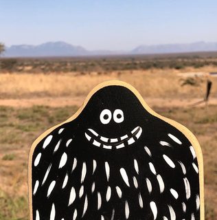 A Lyle held up in front of South Africa – Bushbuck Ridge, Timbavati