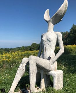A Lyle held up in front of Taconic Sculpture Park