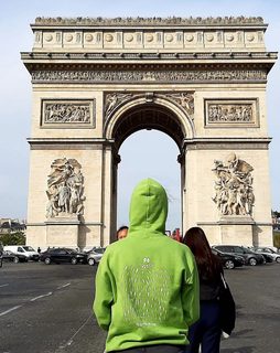A Lyle held up in front of Paris