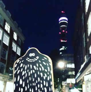 A Lyle held up in front of BT Tower