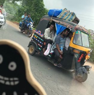 A Lyle held up in front of Kolkata