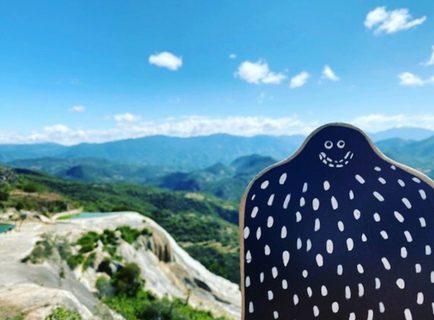 A Lyle held up in front of Hierve El Agua, Oaxaca, Mexico
