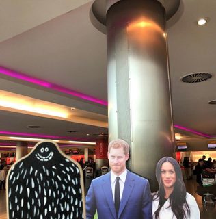 A Lyle held up in front of Heathrow Airport