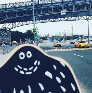 A Lyle held up in front of Kremlin, Moscow