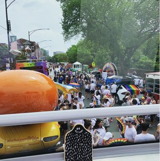 A Lyle held up in front of Uptown, Chicago