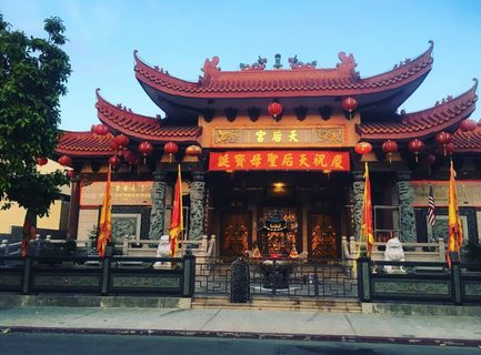 A Lyle held up in front of Chinatown LA