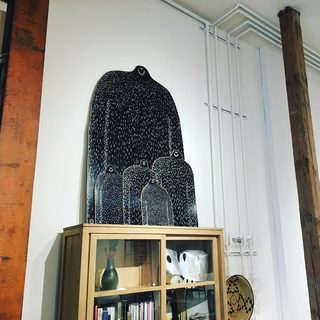 A Lyle held up in front of SOBU Oakland