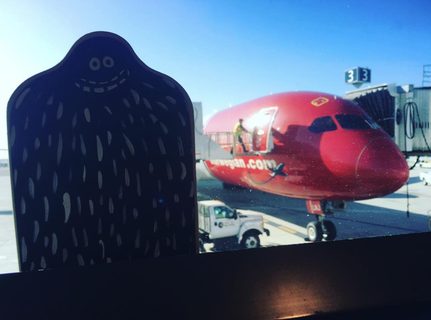 A Lyle held up in front of Oakland International Airport