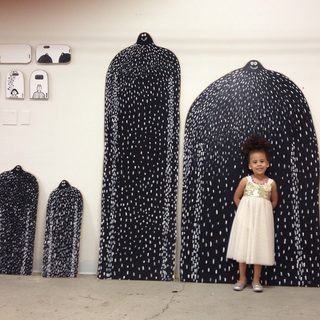 A Lyle held up in front of Unique LA