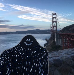 A Lyle held up in front of Golden Gate Bridge