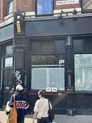 An ant left in a public place, Brick Lane